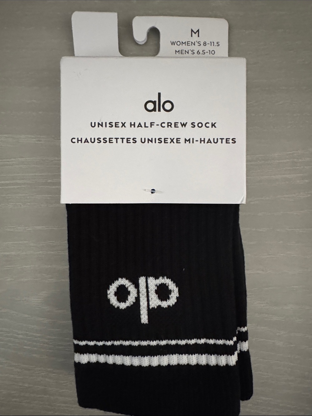 ALO Yoga Black Half-Crew Athletic Socks with White Logo and Twin Stripes